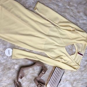 Yellow backless dress with chain